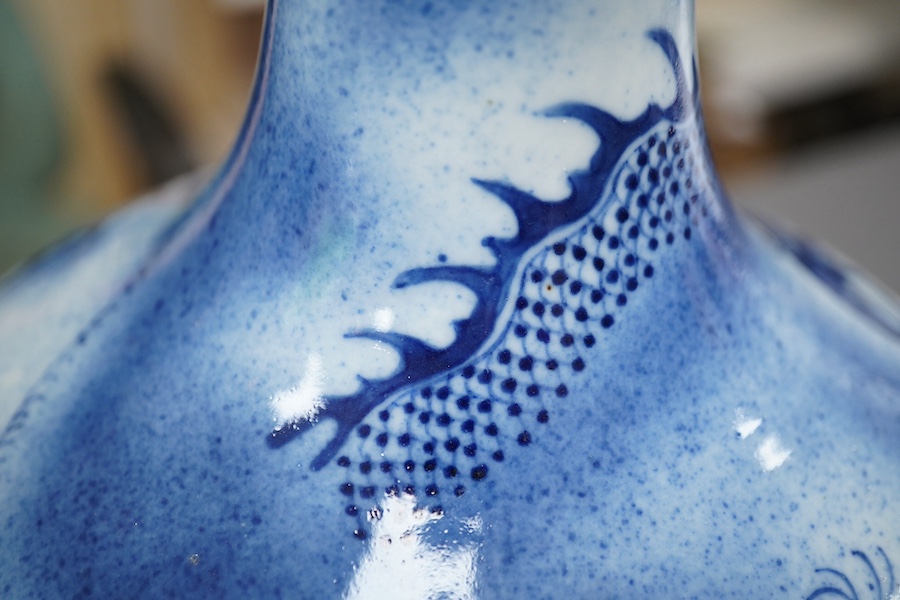 A Chinese blue and white ‘dragon’ bottle vase, 19th century